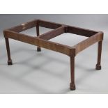 A Georgian style mahogany occasional table (lacking top), with canted corners & square tapered