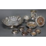 A pair of early 19th century Sheffield plated wine coasters with cast foliate rims & inset turned