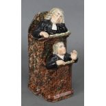 An early 19th century Staffordshire creamware pulpit group of ‘The Vicar & Moses’, the pulpit with
