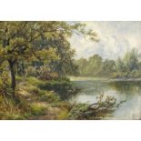 MONOGRAM C.L.S. (English, 19th century). A rural river landscape with figure in a rowing boat beside