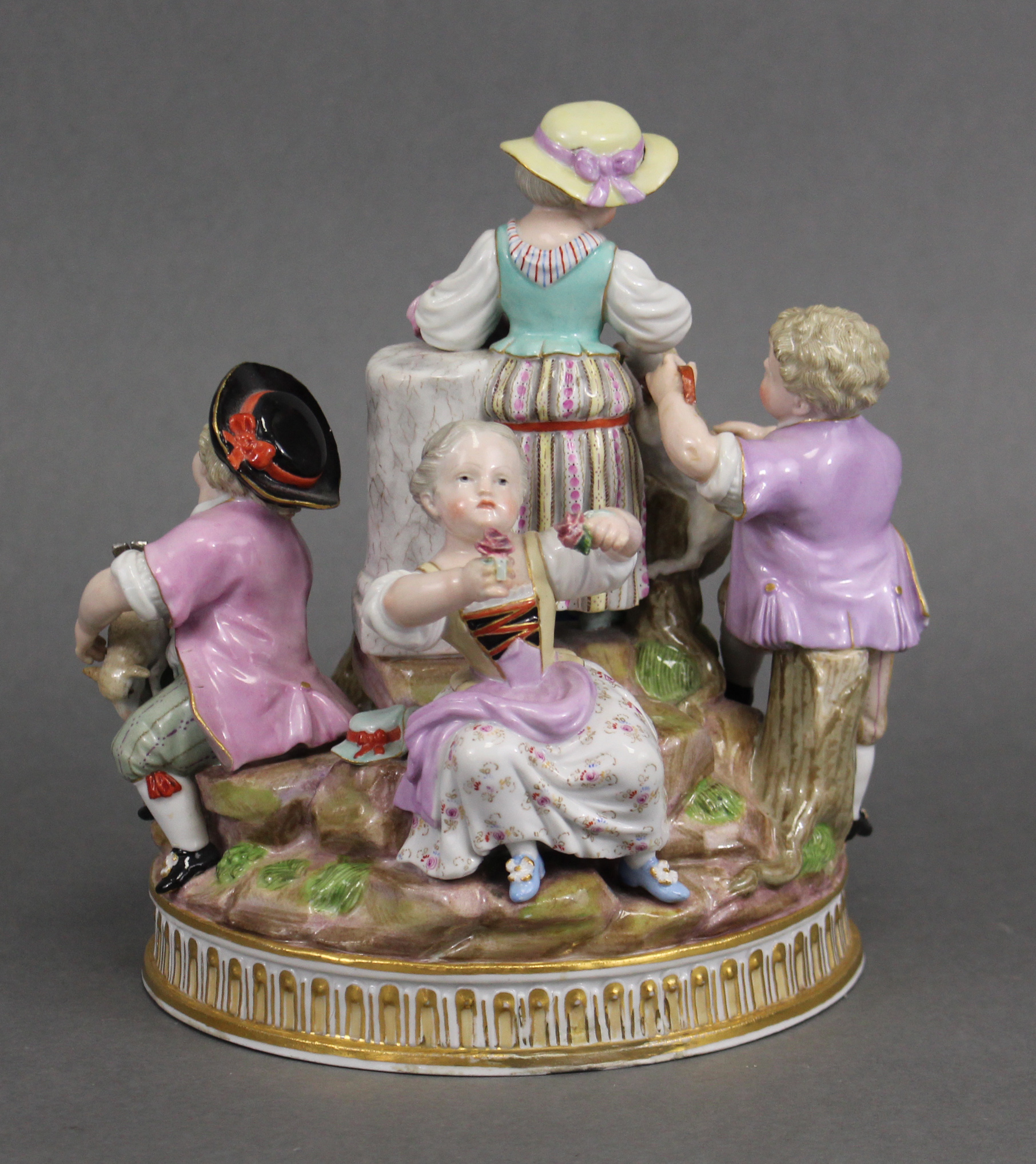 A MEISSEN PASTORAL GROUP of three female & two male figures about a central truncated column, one - Image 3 of 5