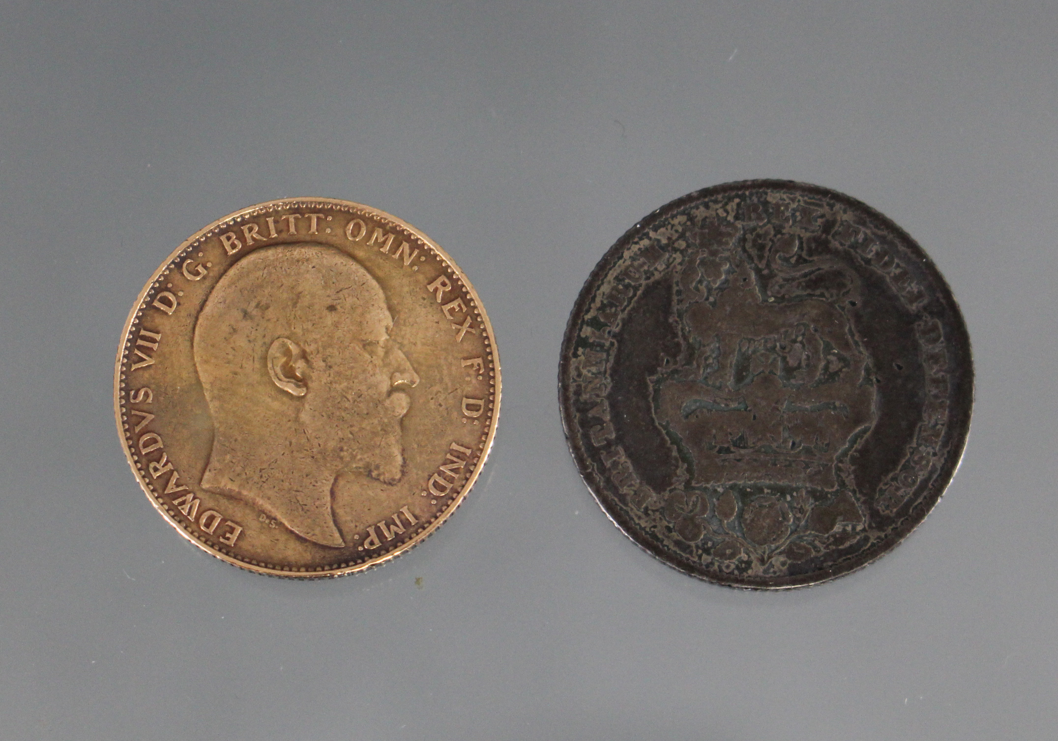 An Edward VII sovereign, Perth mint, 1910; together with a George IV shilling, 1826. - Image 2 of 2