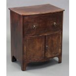A George III mahogany small bow-front cupboard (converted from a commode) with ebonised string