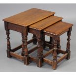 A nest of three 17th century style oak rectangular occasional tables on turned legs with plain