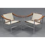 A pair of 1970s contemporary LC1 Basculant armchairs after the design by Le Corbusier, Pierre