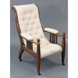 An Arts & Crafts oak armchair with high scroll back upholstered buttoned cream fabric, the padded