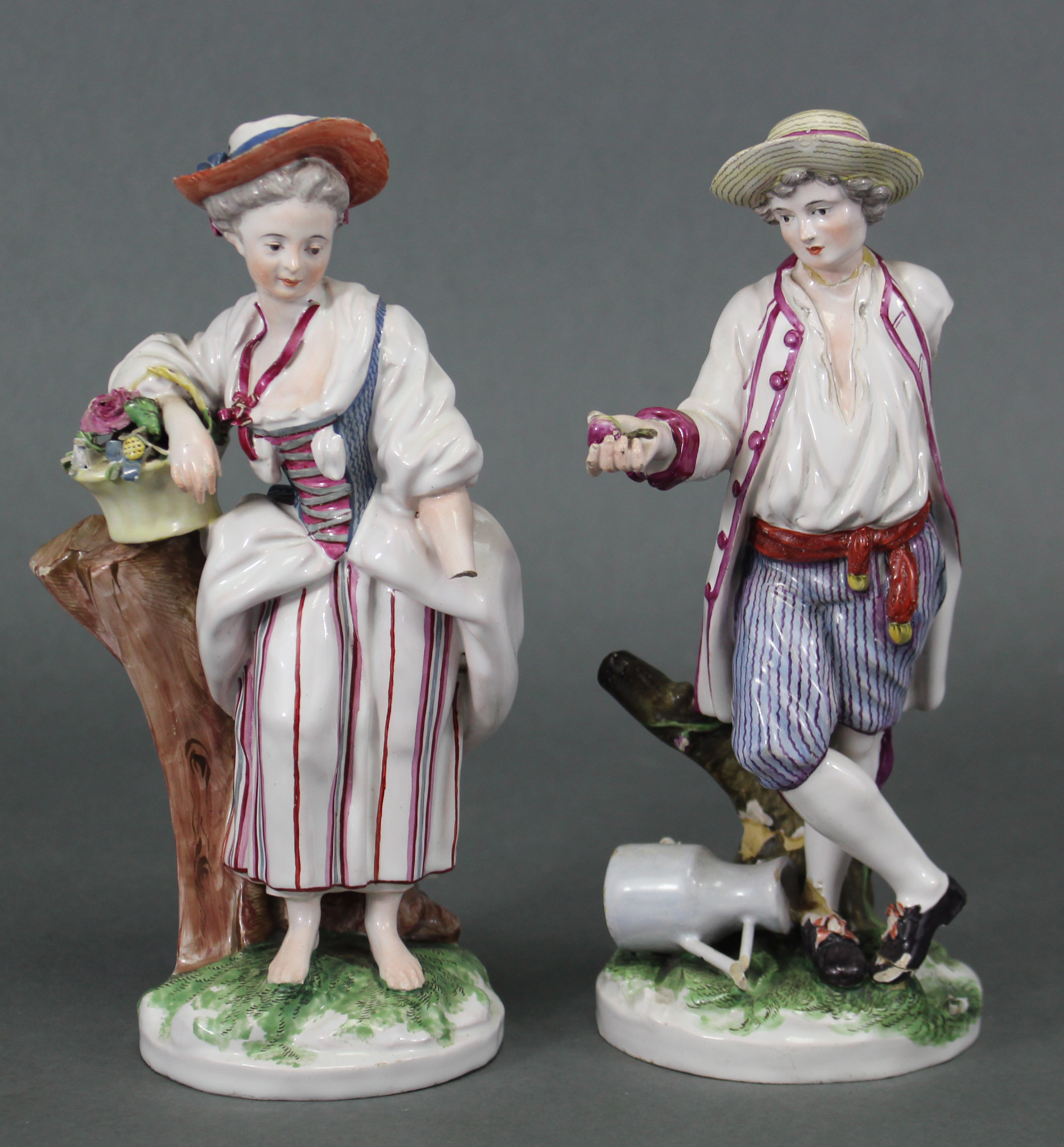 A pair of late 18th century Niderviller faience male & female standing figures in rustic dress, he