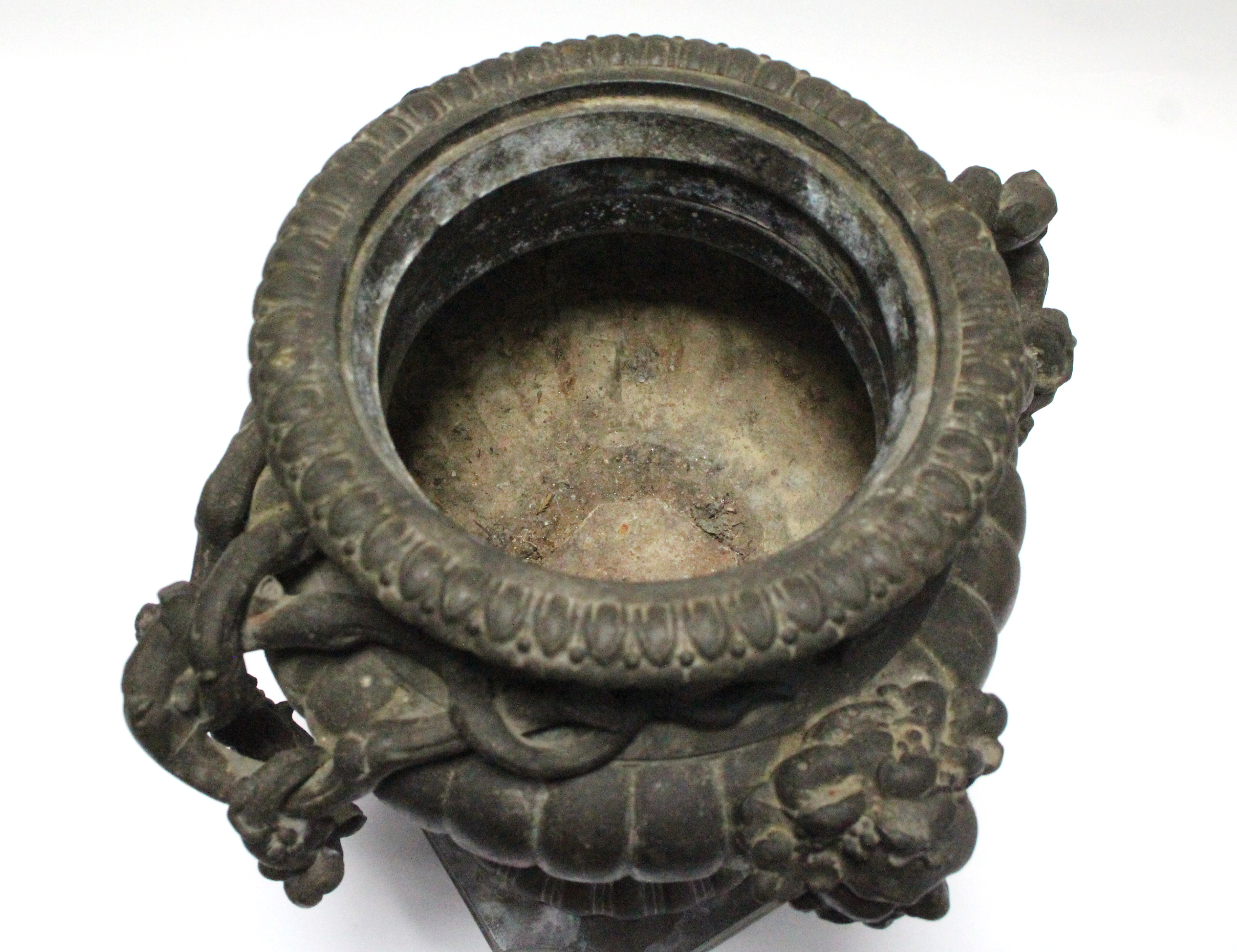 A 19th century bronze urn of fluted ovoid form, with grapevine side handles & Bacchus masks, on - Image 3 of 3