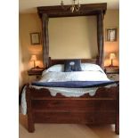 A 17th century-style OAK DOUBLE BEDSTEAD, incorporating early elements, with shaped side rails &