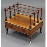 An early Victorian mahogany & parcel-gilt three-division canterbury with turned uprights & dividers,