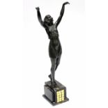 PIERRE Le FAGUAYS (attributed to). A bronze standing figure of a female gymnast, her arms raised
