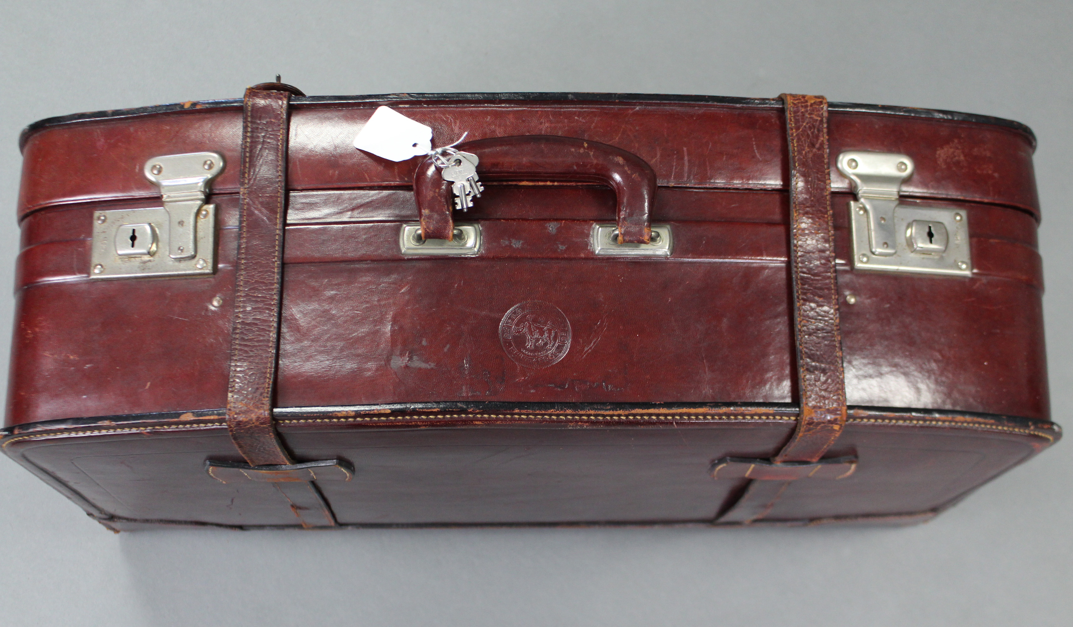 A Chinese “Rhinocerous” brand brown leather large suitcase by the Fook Seng Company. - Image 2 of 3