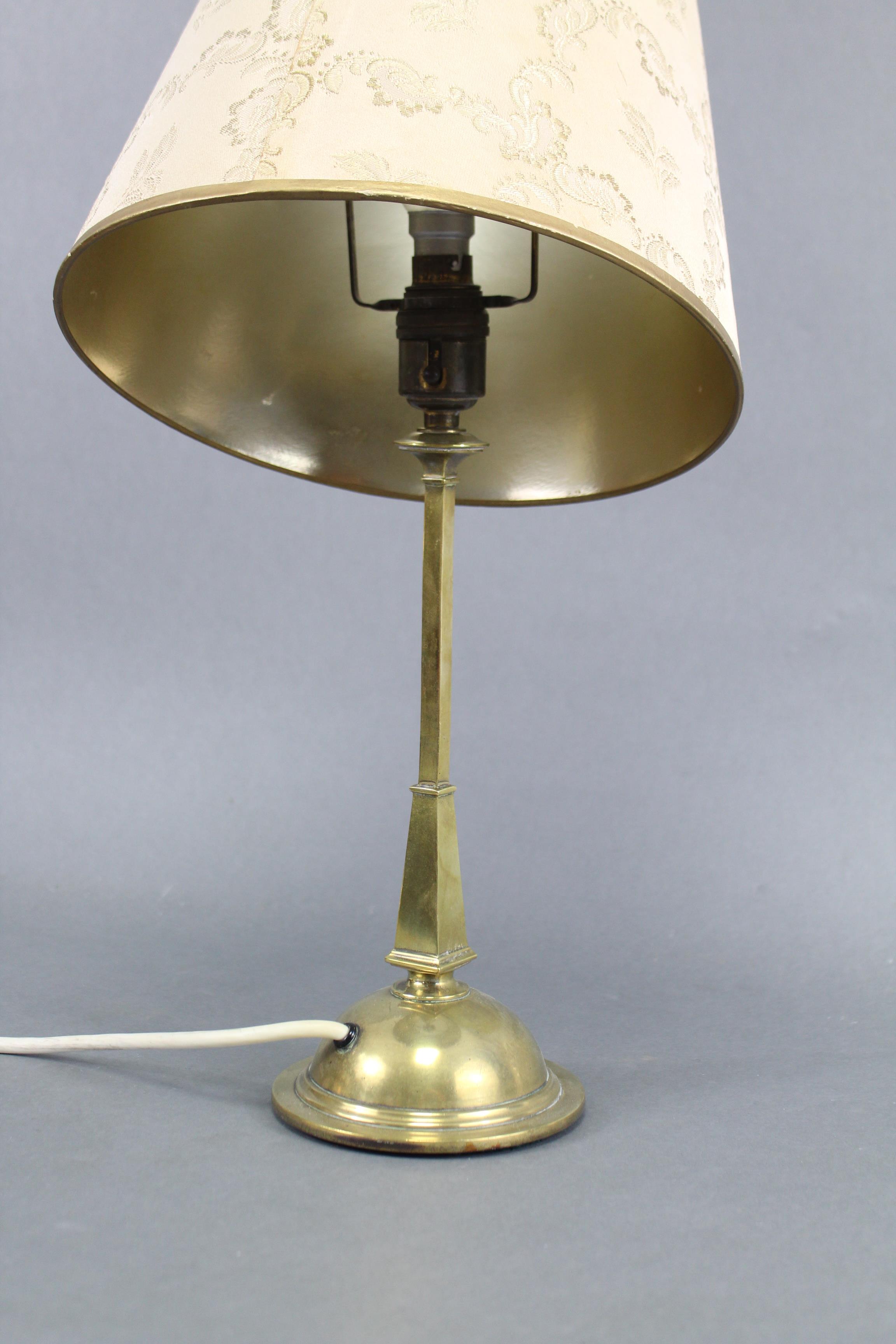 An Edwardian brass table lamp on slender square tapered column & domed circular base, stamped “Rd. - Image 3 of 3