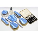 An Art Deco silver & blue guilloche enamel seven-piece dressing table set, Birmingham 1934/5 (part