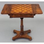 A William IV rosewood drop-leaf pedestal table with parquetry chessboard top, fitted frieze drawer