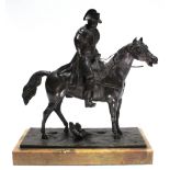 A 19th century French bronze equestrian figure of Napoleon Bonaparte, turned slightly to the