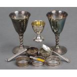 A silver pencil holder, Chester 1911, by Sampson Mordan & Co. Ltd.; a silver egg cup, teaspoon &