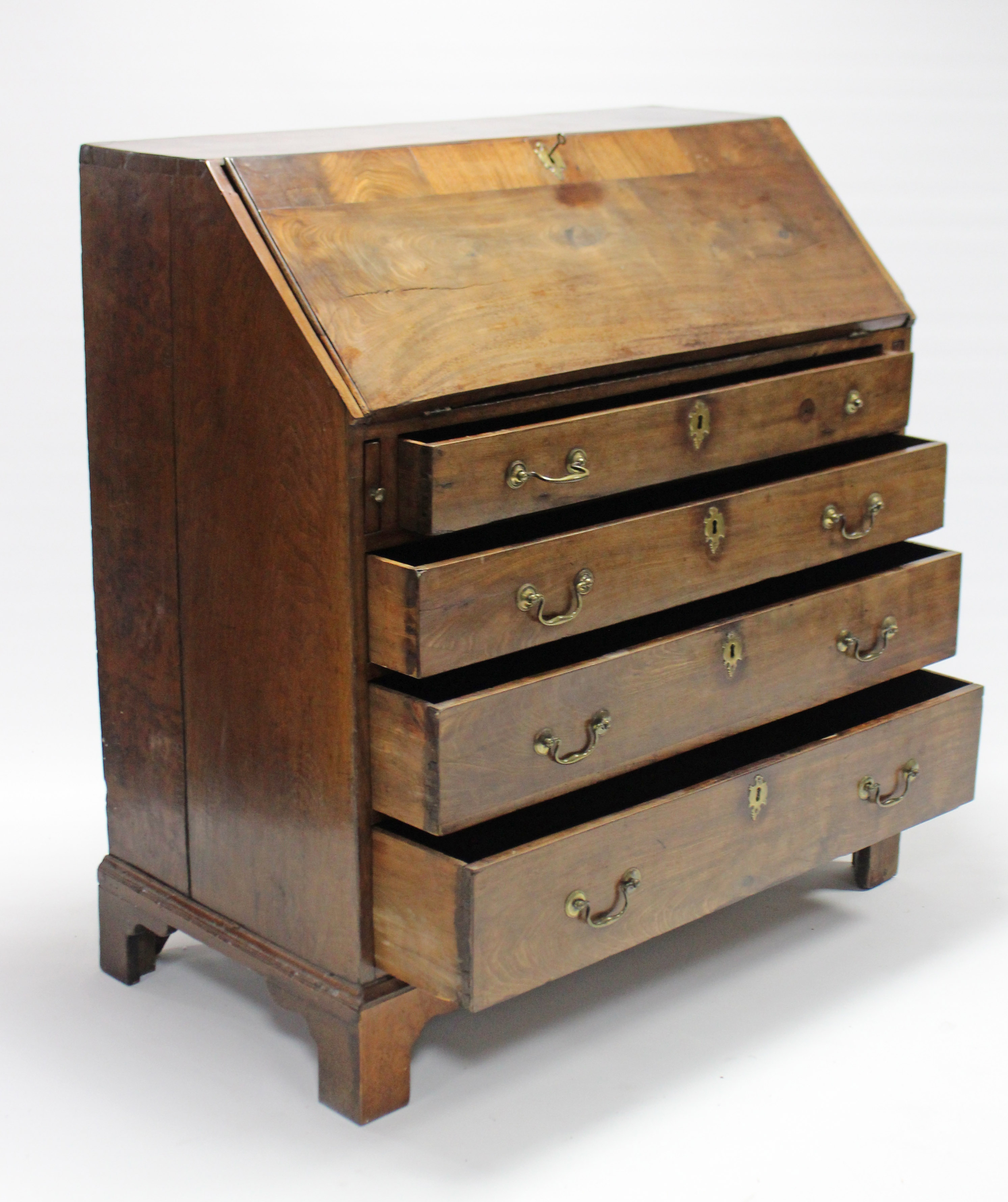 An 18th century mahogany, elm & burr-elm bureau with a fitted interior enclosed by fall-front - Image 3 of 3