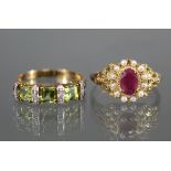 An un-marked yellow metal ring set oval ruby within a border of seed pearls & with pierced scroll