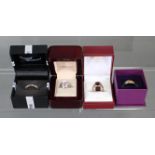 A quantity of costume jewellery, including five 9ct. gold gem-set rings, & a 9ct. three-colour