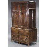 A late 17th/early 18th century joined oak press cupboard, enclosed by pair of fielded panel doors