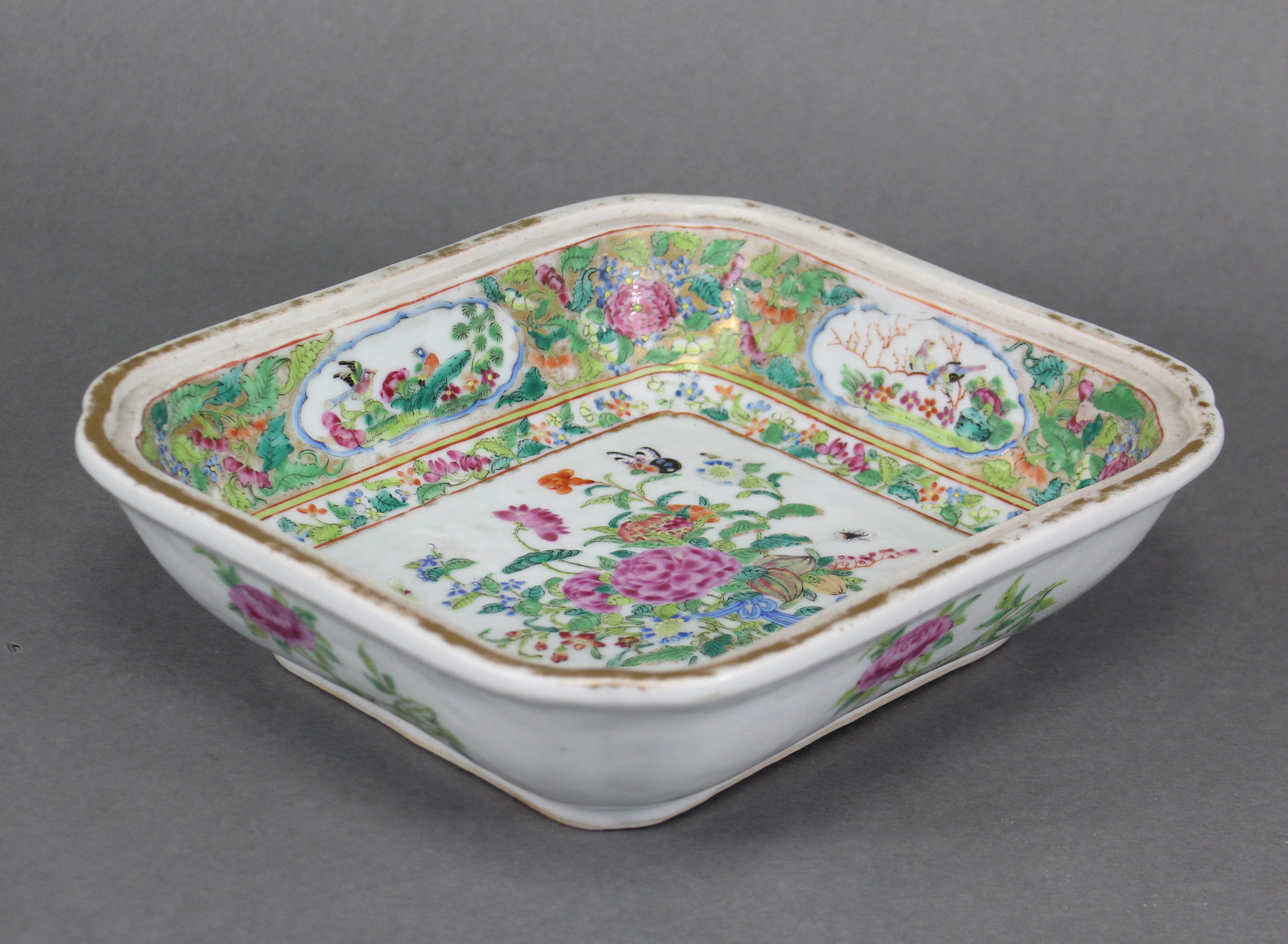 A 19th century Cantonese porcelain square dish decorated in famille rose enamels with a bouquet of - Image 3 of 3