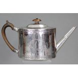 A George III silver teapot of straight-sided oval form with bright-cut floral borders, a vacant