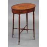 A Regency satinwood oval work table, having lift-top with rosewood crossbanding & enclosing a fitted