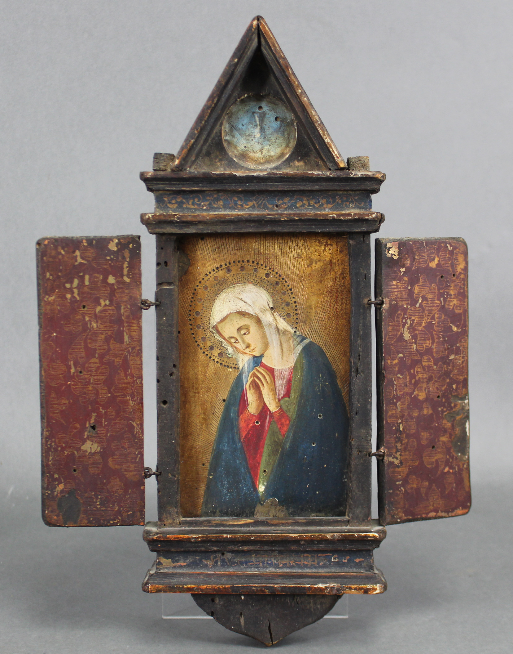 An Italian renaissance style tabernacle with half-length portrait of the Madonna painted in oils &