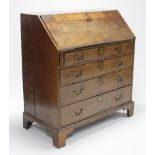 An 18th century mahogany, elm & burr-elm bureau with a fitted interior enclosed by fall-front