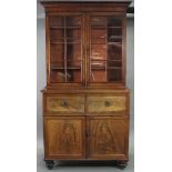 AN 18th century FIGURED MAHOGANY SECRETAIRE BOOKCASE with three adjustable shelves to the top,