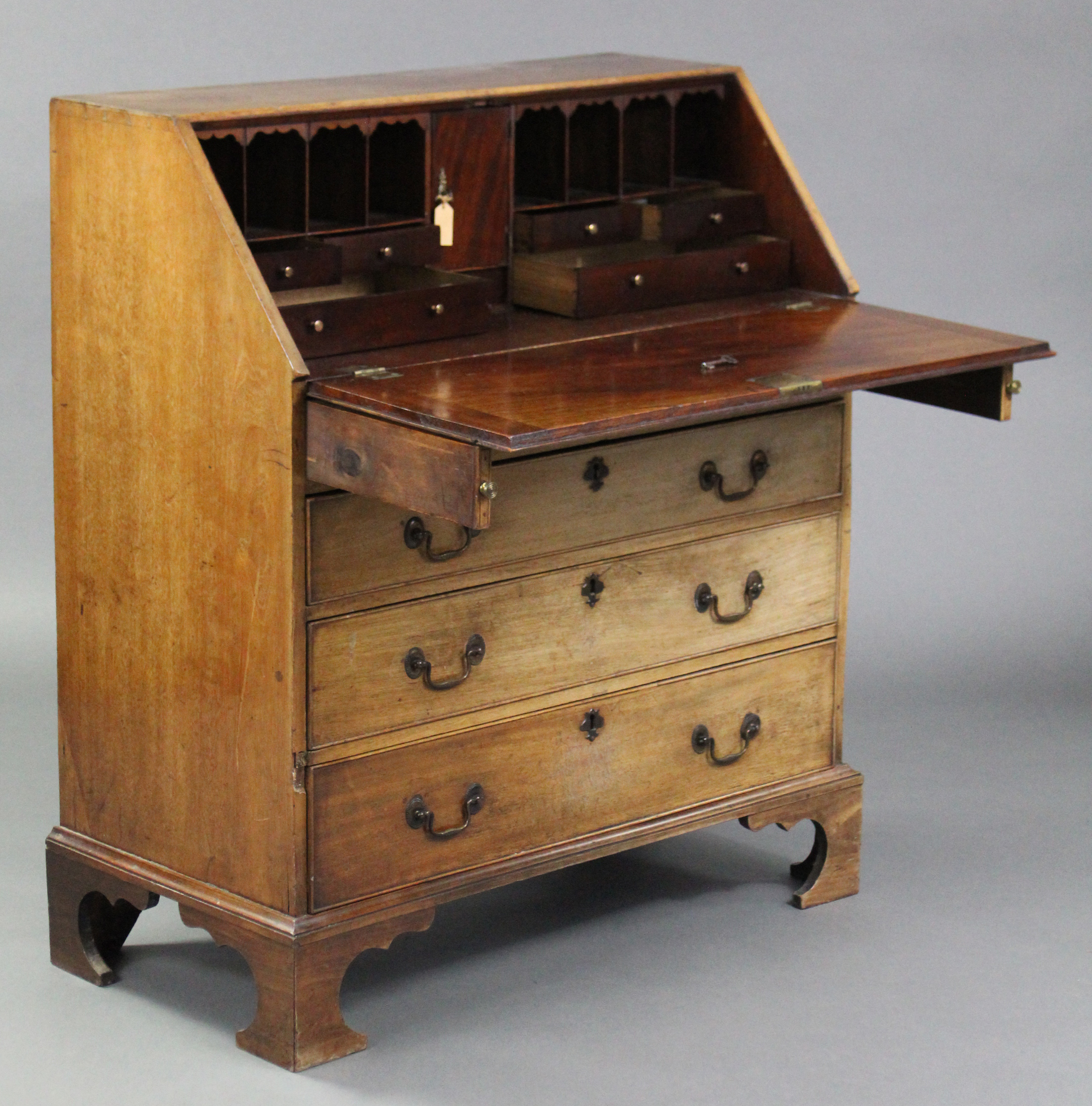 A late 18th century mahogany bureau, the sloping fall-front enclosing a fitted interior above four - Image 2 of 4