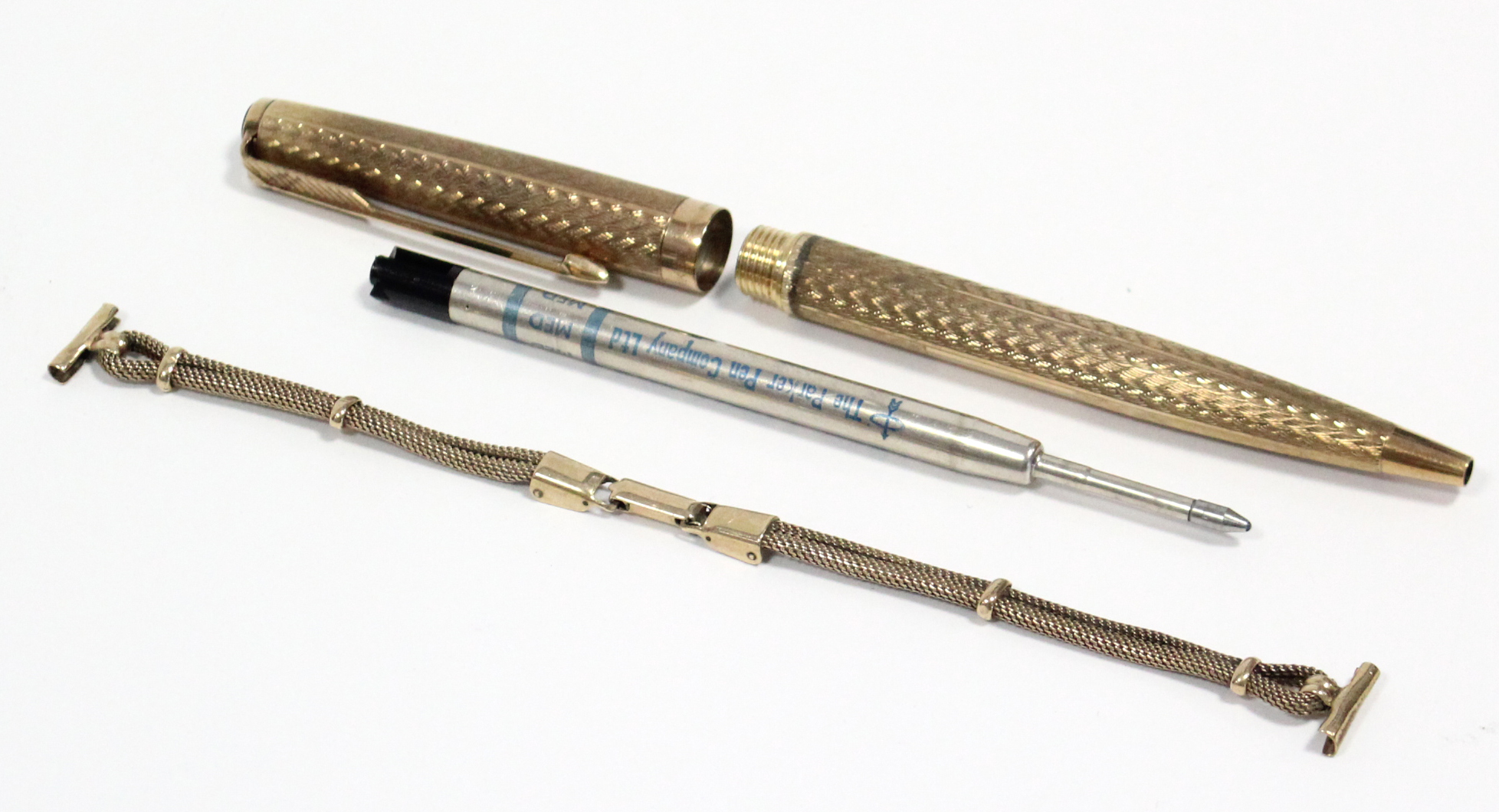 A Parker ball point pen in 9ct. gold case with engine-turned decoration, hallmarks for London 1968; - Image 3 of 4