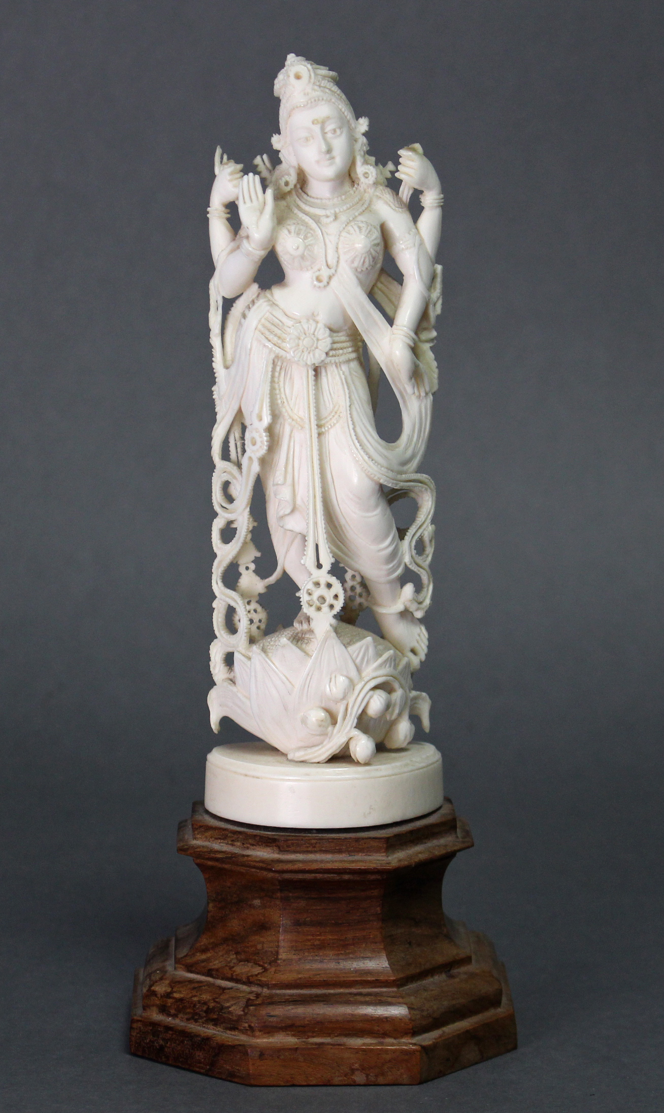A 19th century ivory model of the goddess Laxmi, on wooden plinth base; 9“ high. - Image 2 of 4