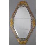 A French Art Deco lozenge-shaped wall mirror, with bevelled plate in marble-effect & gilt foliate-