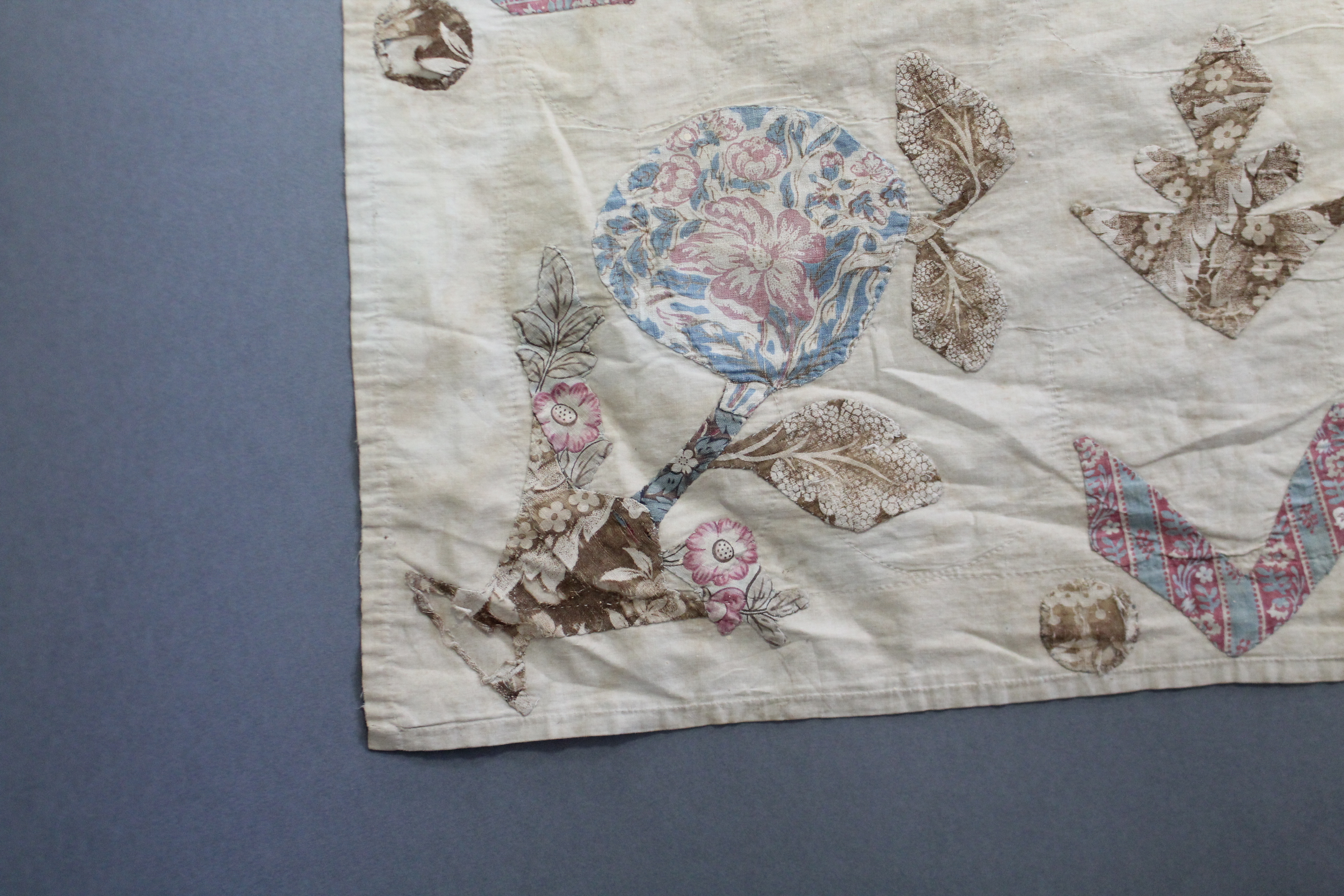 ROYAL INTEREST: AN EARLY 19th century PATCHWORK BEDSPREAD reputedly by Princess Charlotte of - Image 11 of 12