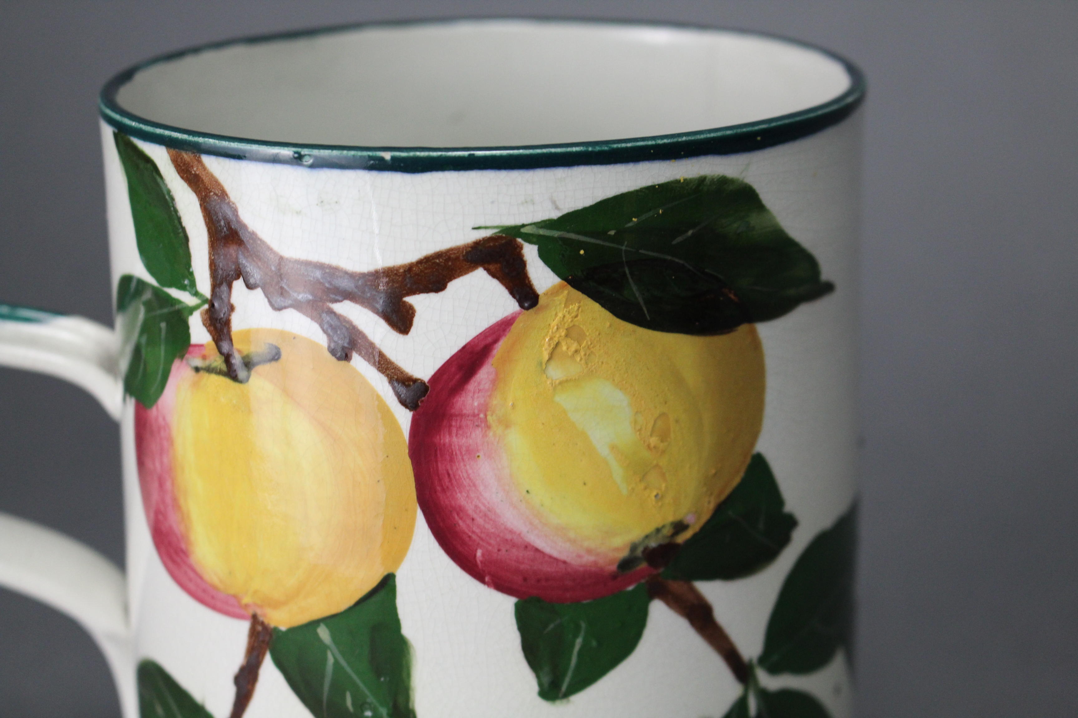 A Wemyss Ware (R. Heron & Son) pottery large cylindrical mug painted with the “Apples” pattern; - Image 5 of 8