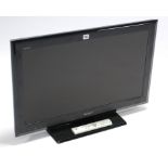 A Sony “Bravia” 31” LCD television with remote control.