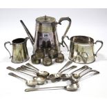 An engraved silver plated three-piece tea set of oval tapered form; five eastern white-metal
