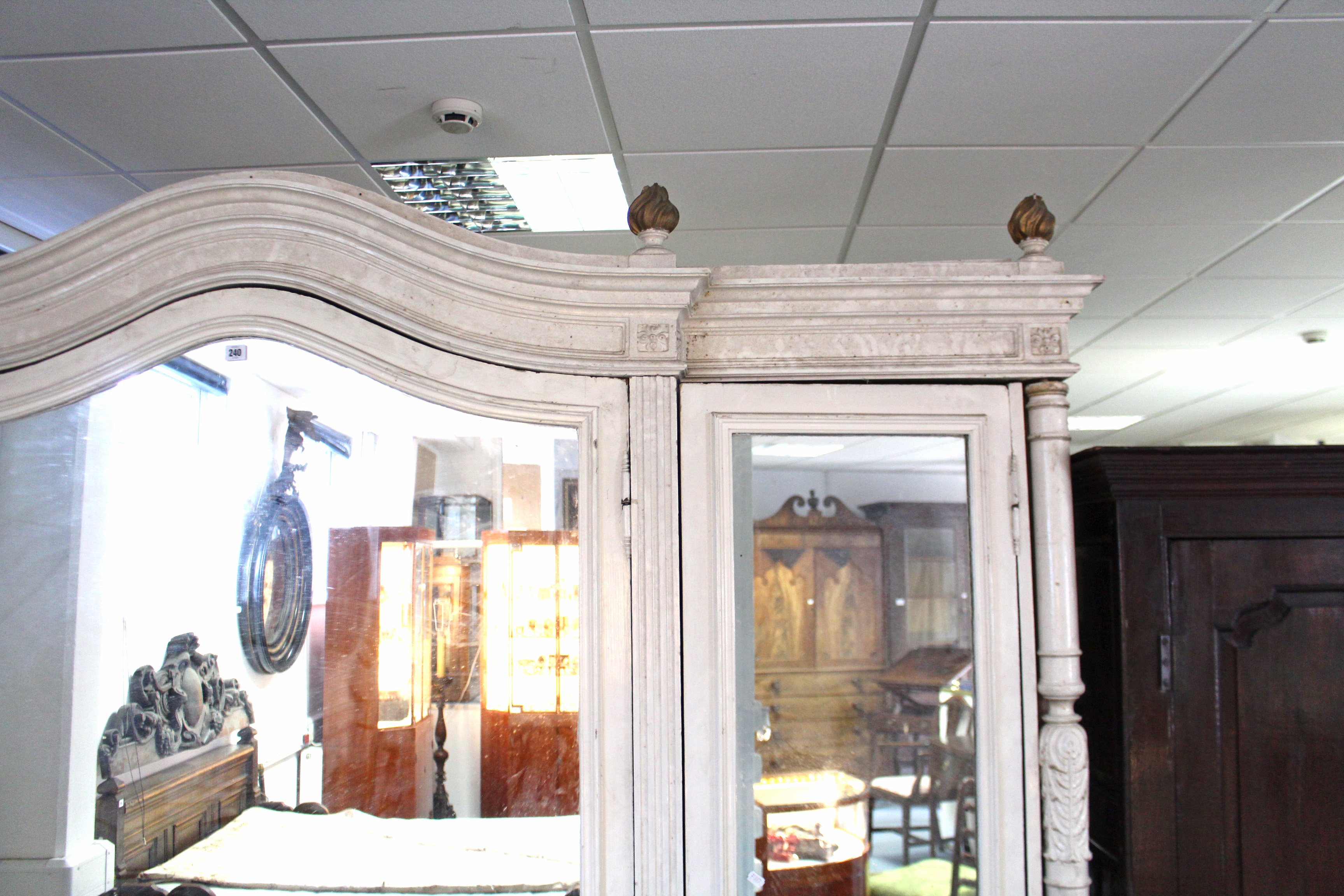 A large painted mahogany wardrobe with shaped cornice, panel door to centre with mirror door - Image 5 of 5