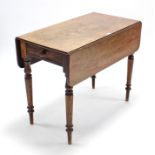 A Victorian mahogany Pembroke table, fitted end drawer & on turned round tapered legs, 35½” wide