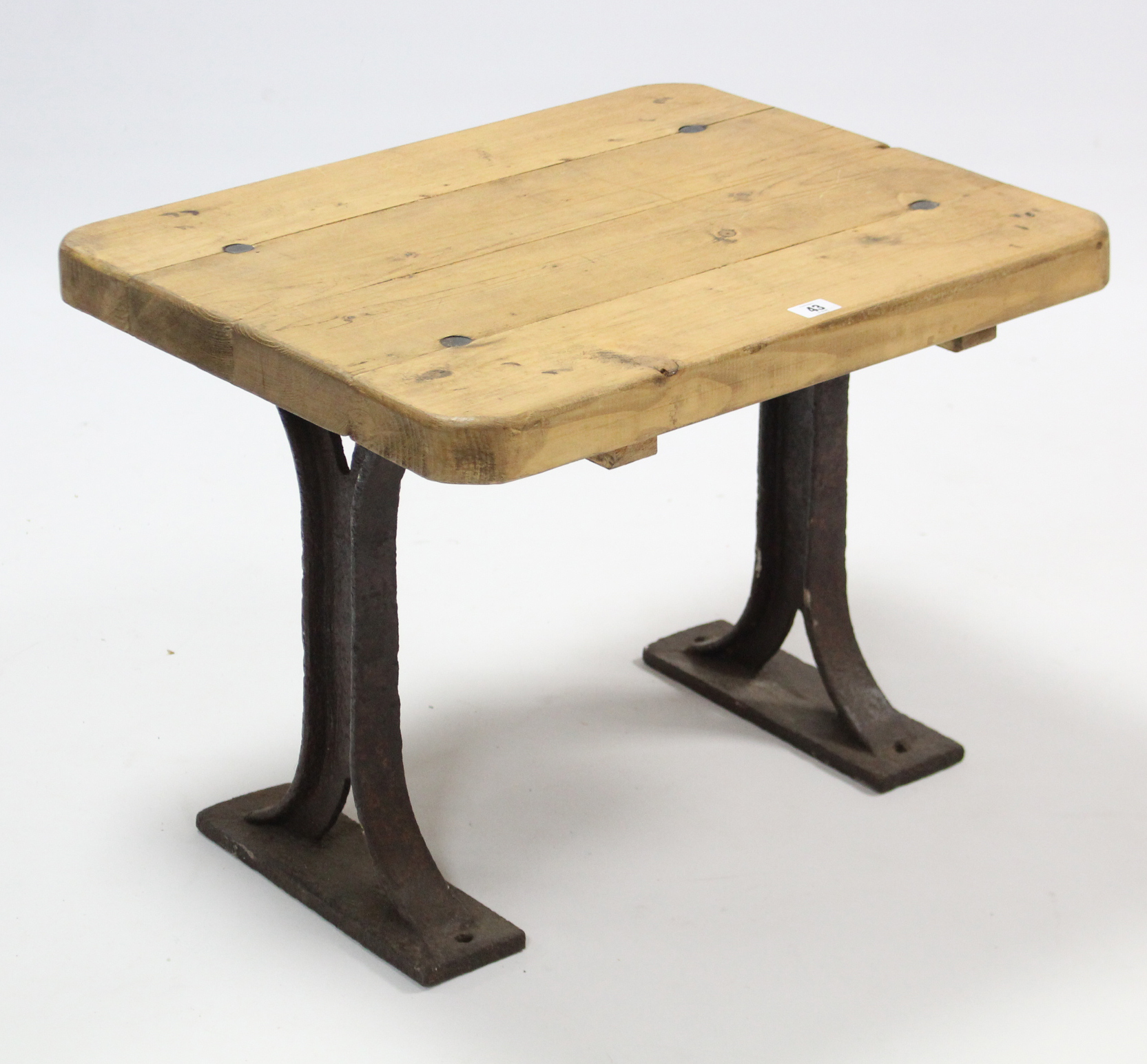 A pine rectangular occasional table on cast-iron base, 23¾” wide.