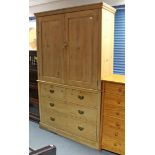 A VICTORIAN PINE LINEN PRESS, the upper part fitted three shelves enclosed by pair of panel doors,