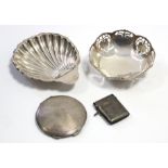 A George V silver shell-shaped butter dish, Sheffield 1911; a pierced octagonal sweetmeat dish,