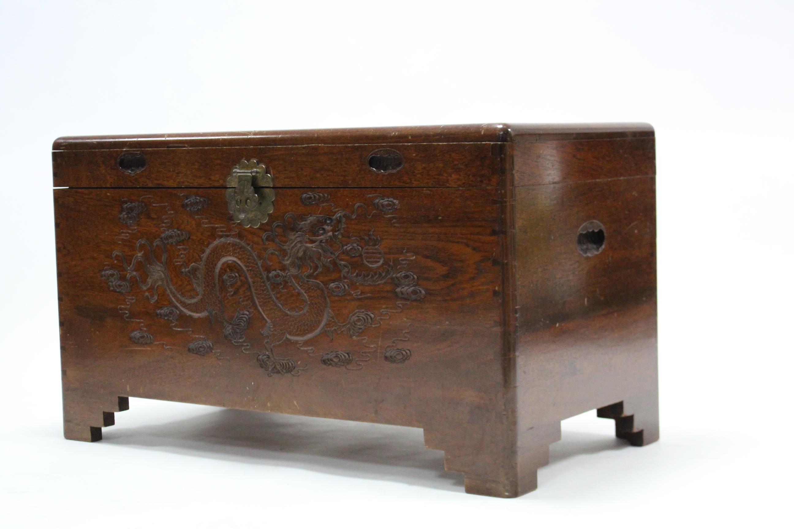 A Chinese teak camphor wood chest with carved dragon design to the hinged lift-lid & front, & on - Image 3 of 3