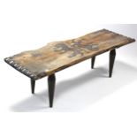 A carved hardwood rectangular low coffee table inscribed “Designed & Made at the Studio of Art &