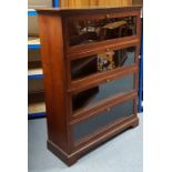 A Mcdonagh globe Wernicke-type mahogany-finish bookcase enclosed by four glazed doors, & on shaped