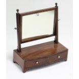 A late 19th/early 20th century mahogany rectangular swing toilet glass fitted two small drawers to