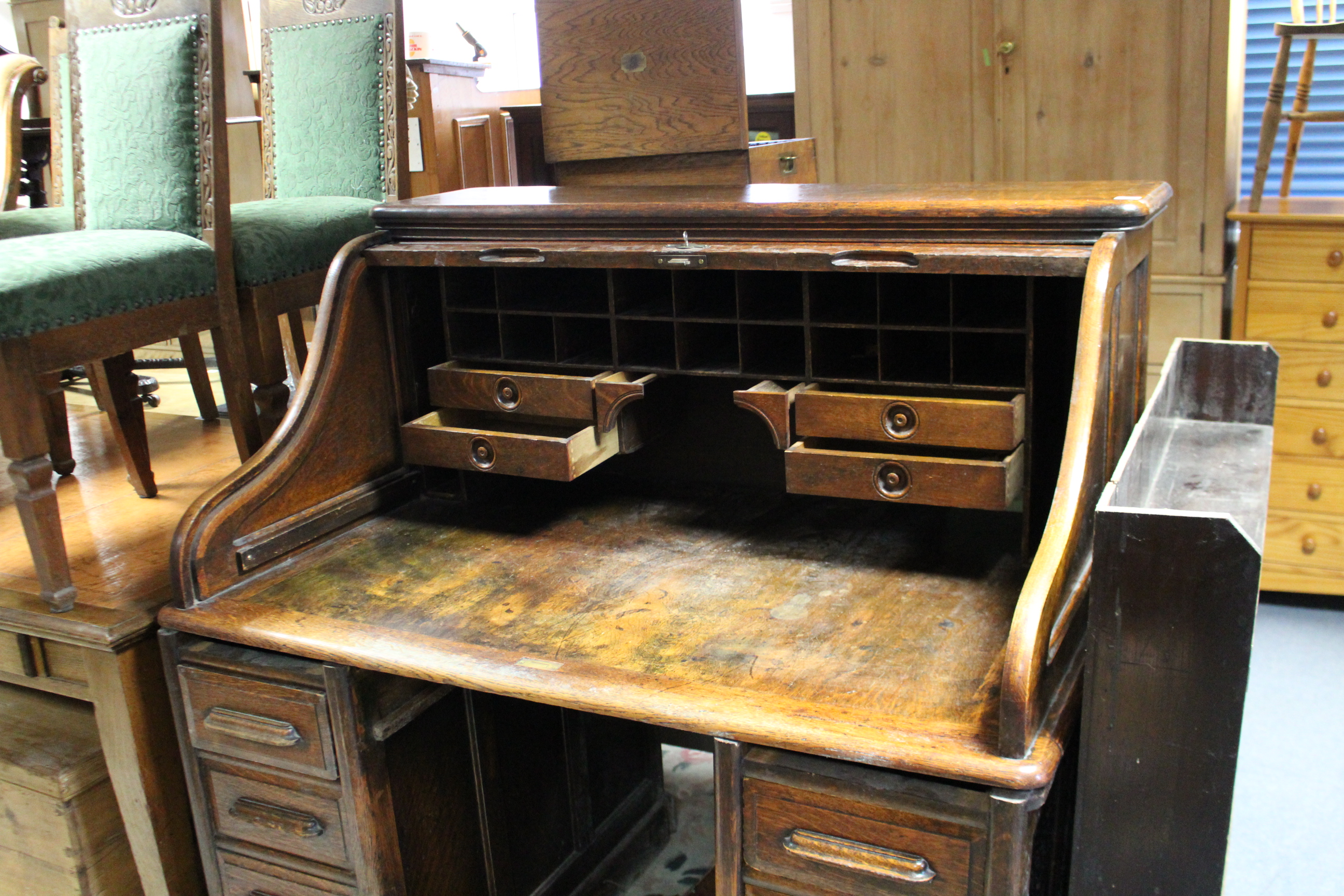 A late 19th/early 20th century oak roll-top pedestal desk with fitted interior enclosed by tambour - Image 3 of 4