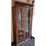 A 19th century mahogany bookcase section with moulded cornice, & with five adjustable shelves